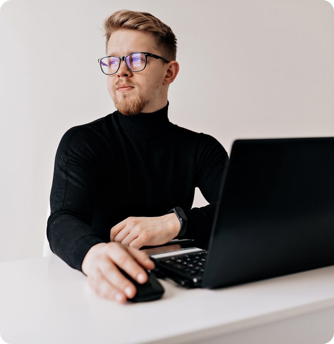 man-in-glasses-with-laptop